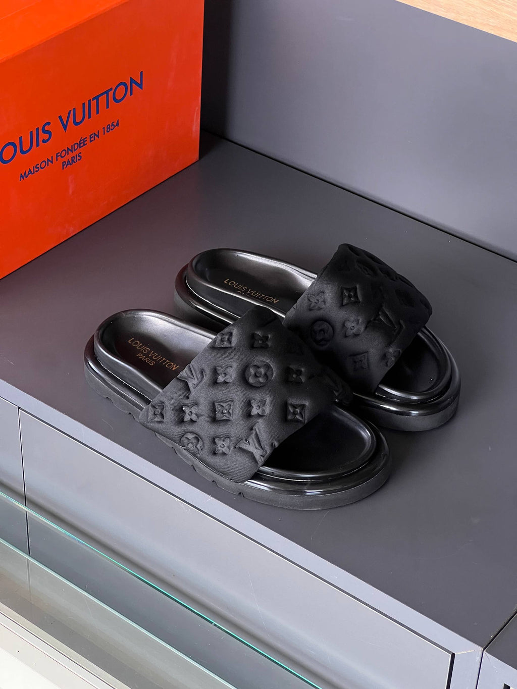 Louis Vuitton Monogram Embossed Slides Black